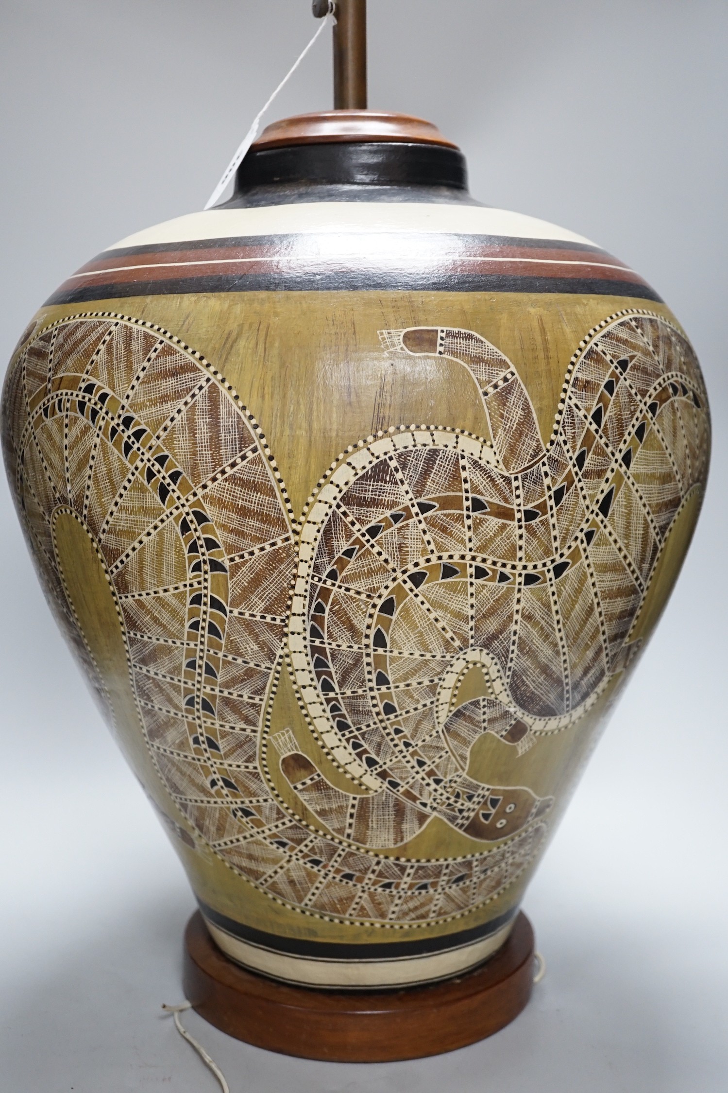 An Australian Aboriginal style painted pottery large lamp, 61cm total height